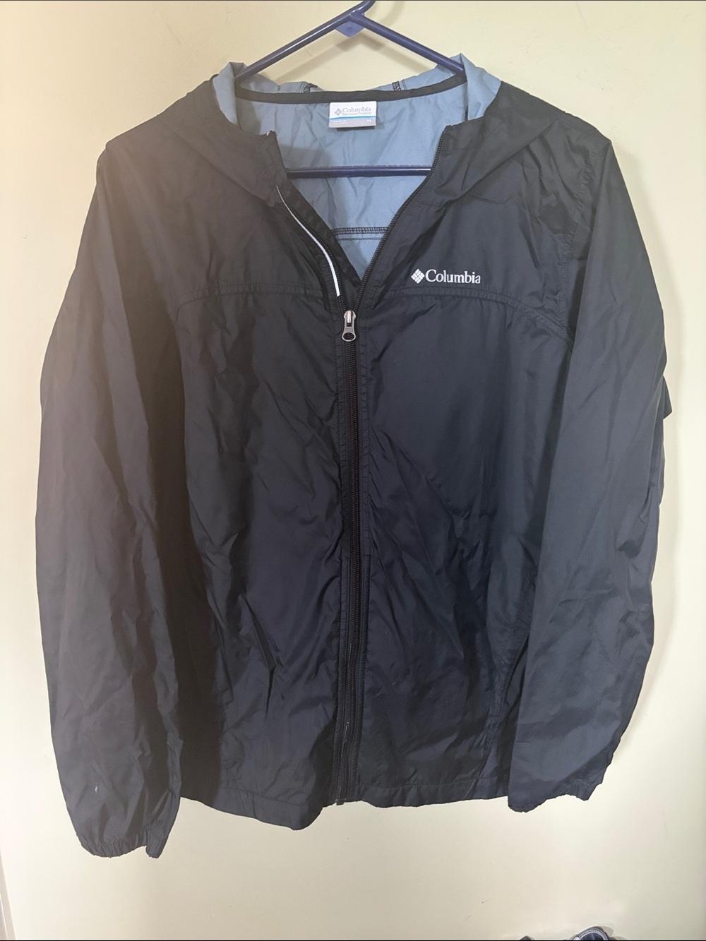 Columbia Big Kid’s Black Hooded Rain Jacket with Light Gray Lining